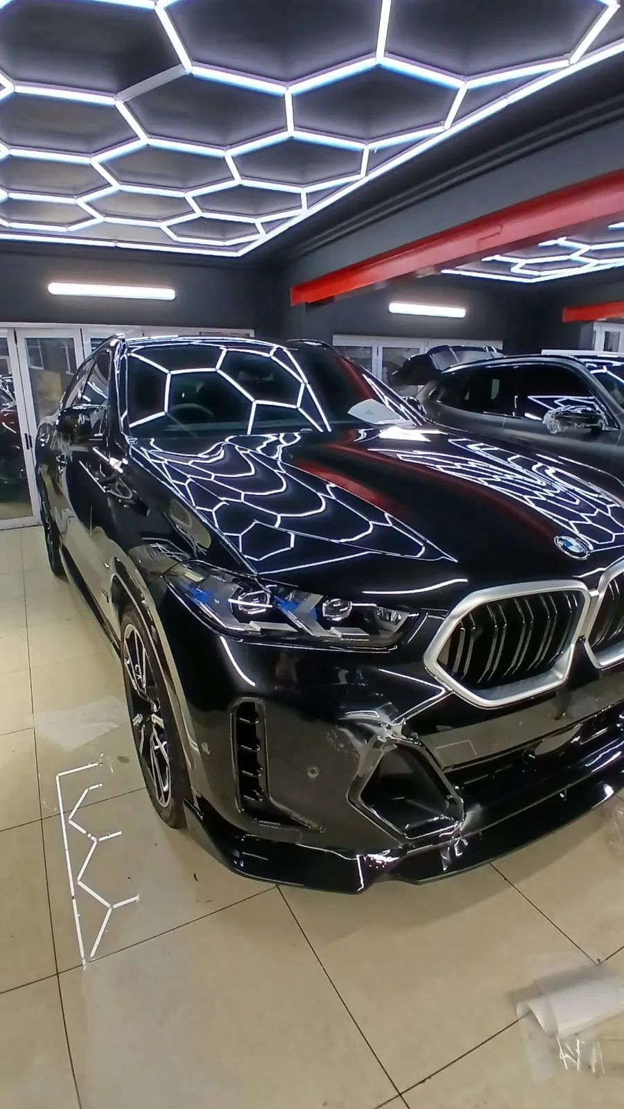 Black BMW photographed in the ClearGuard workshop